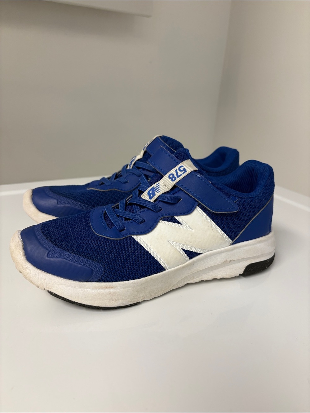 Kids New Balance Blue Athletic Sneakers with elastic laces and Velcro